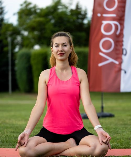 Woman in a calm yoga pose, embodying inner harmony.